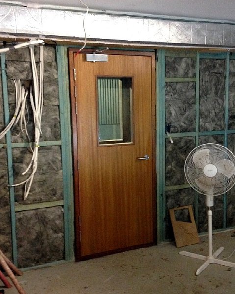 Soundman--Site-Built-Isolation-Door--117---Finished-Entry-Door-From-Inside--BRAUS--Soundman2020--recording-studio-Design.jpg